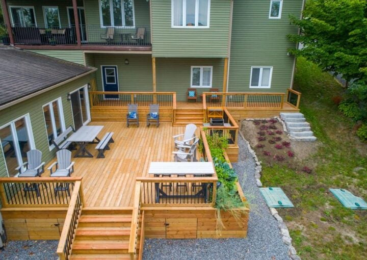 A new natural wood deck in a backyard