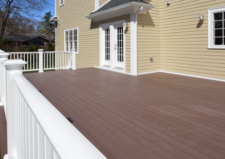 wooden deck with with fence in lawn