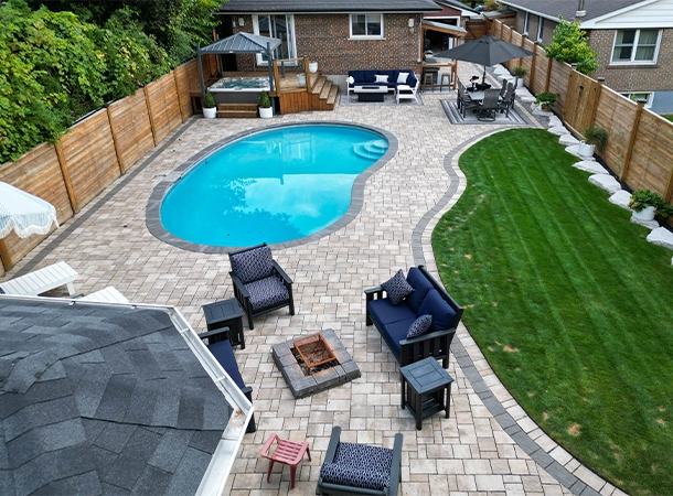 backyard space lawn, pool, interlocking work, fence, outdoor kitchen, landscaping