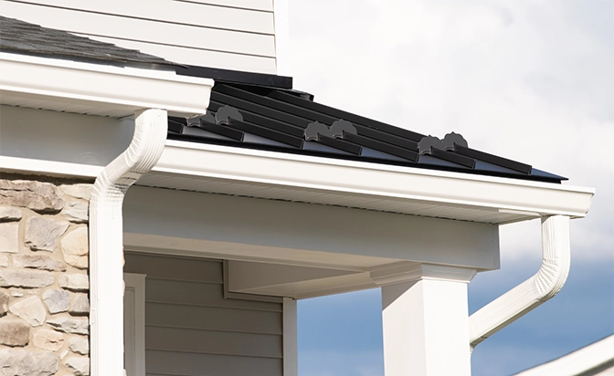 close up view of eavestrough, soffit, and fascia