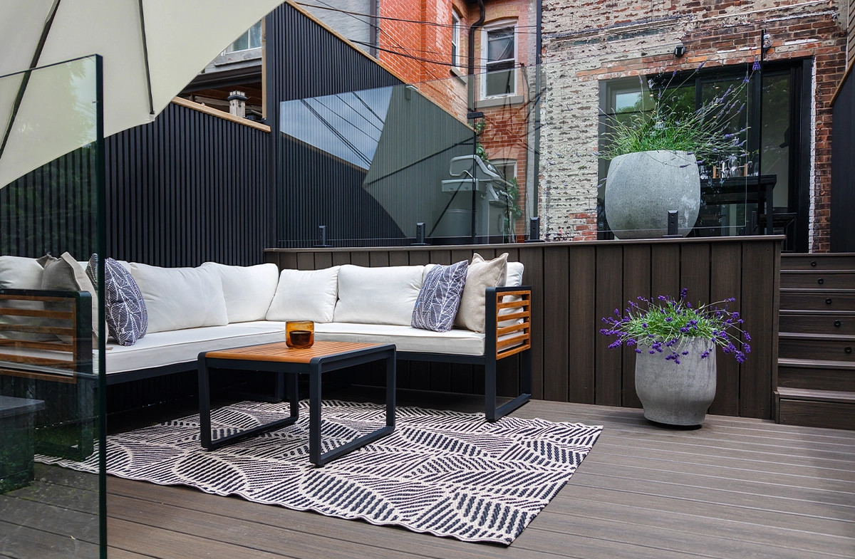 coach sitting setup on backyard deck