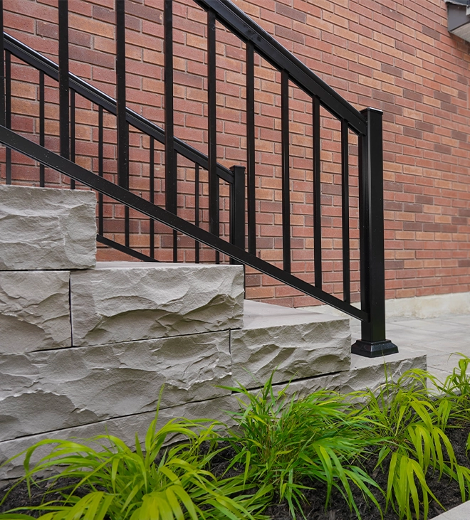 concrete steps and aluminium railing