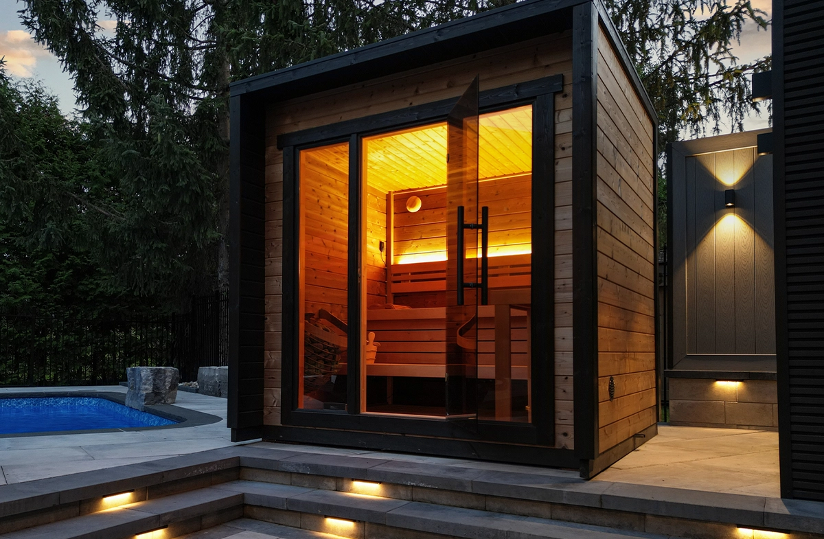 custom carpentry cabanas in yard with pool and interlocking patio