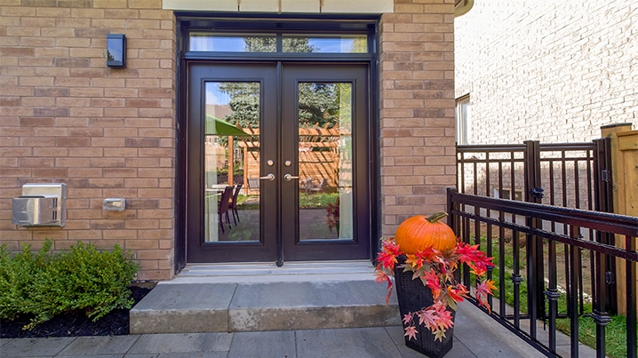 front door entrance with interlocking steps and paver