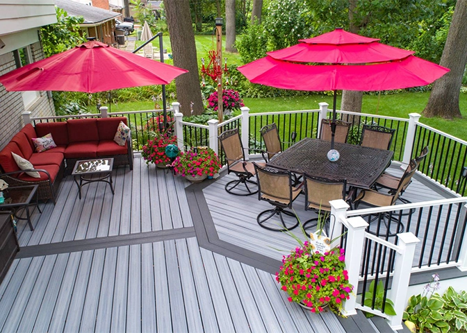 grey with black combination trex deck above ground on home garden