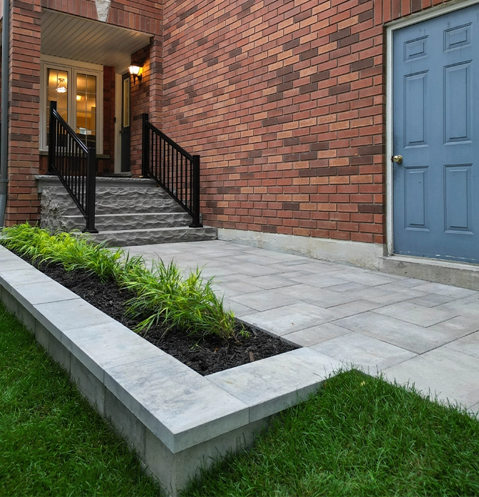 hardscape walkway, landscaping and retaining wall