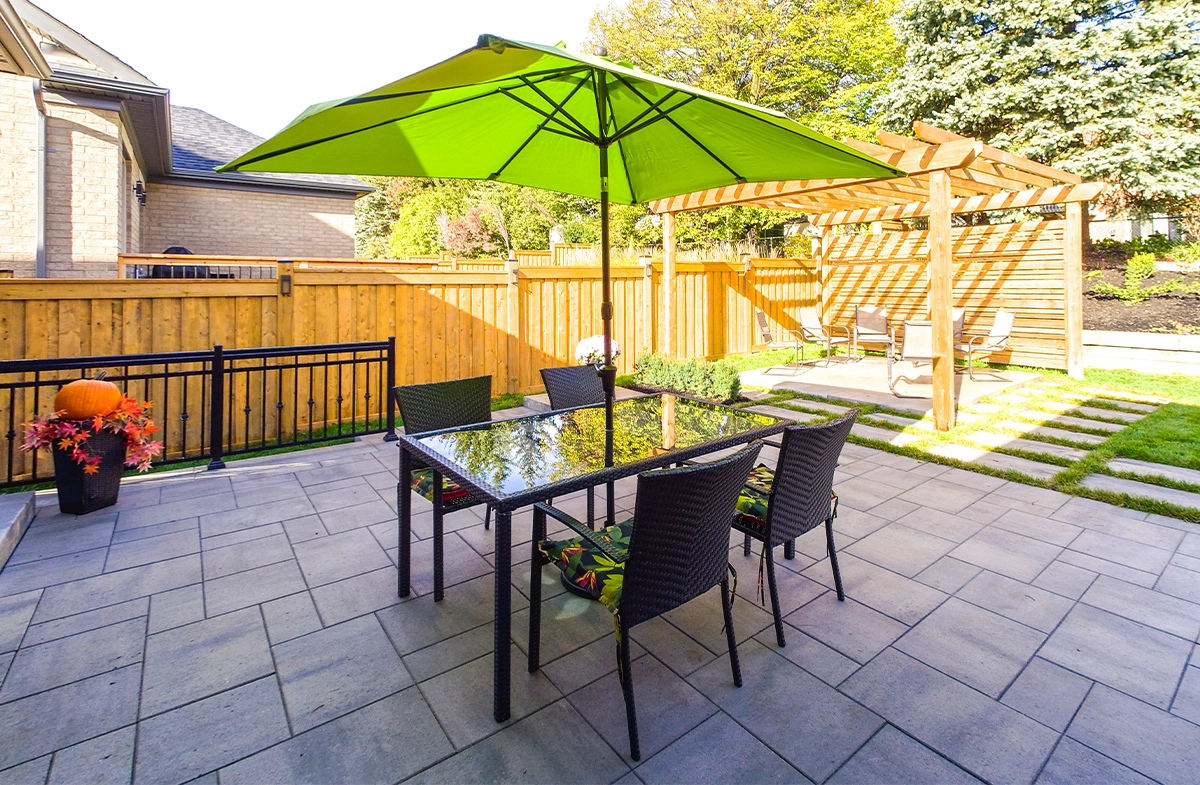 interlocking patio and custom gazebo in backyard