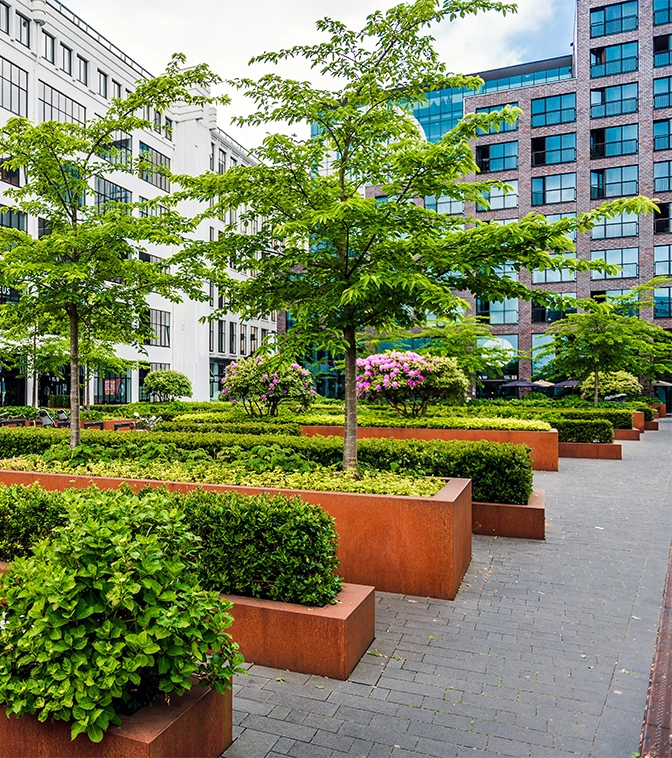 landscaping pots in front of modern office building