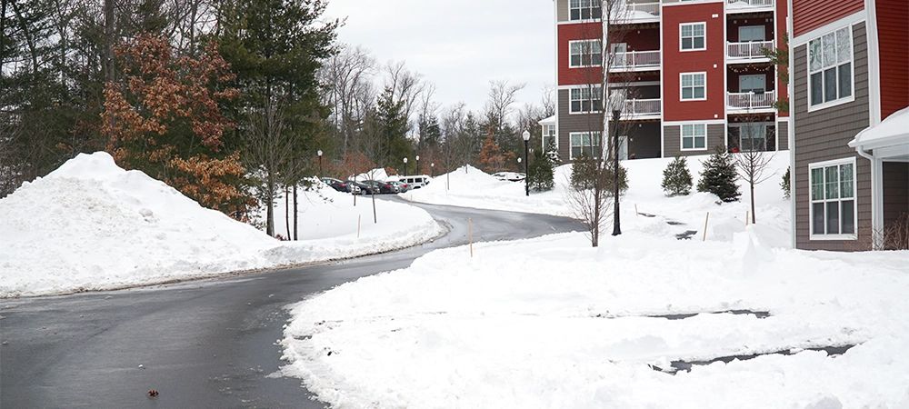 modern apartment building after winter snow storm