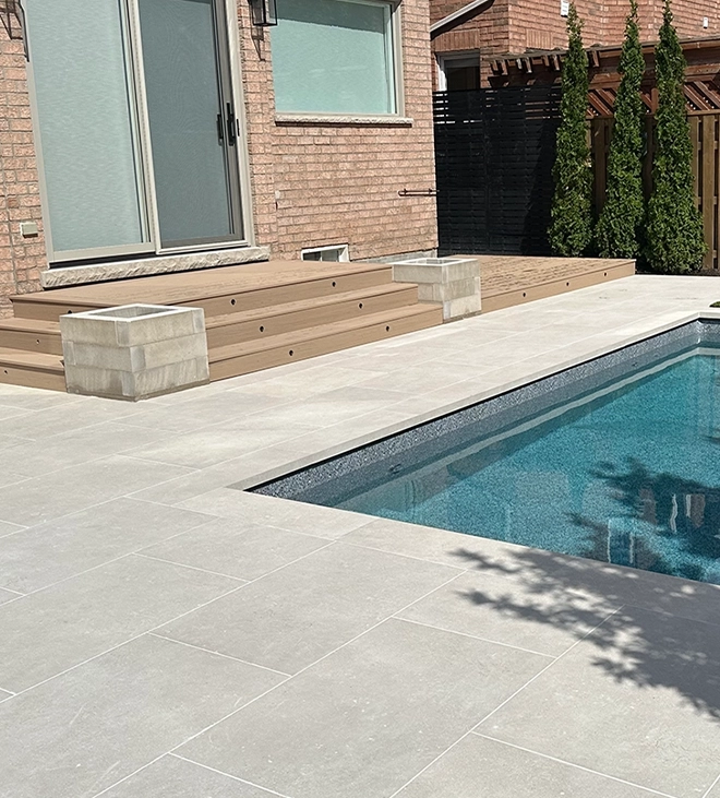 patio with pool and deck