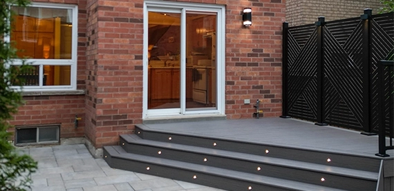 perfectly balances privacy deck with fence at entrance door