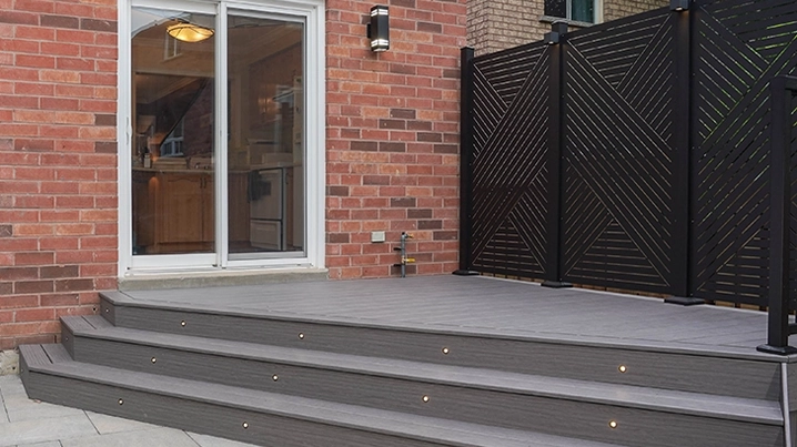 wooden deck with steps and privacy screen