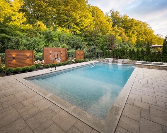 pool with interlock deck and basket ball game setup