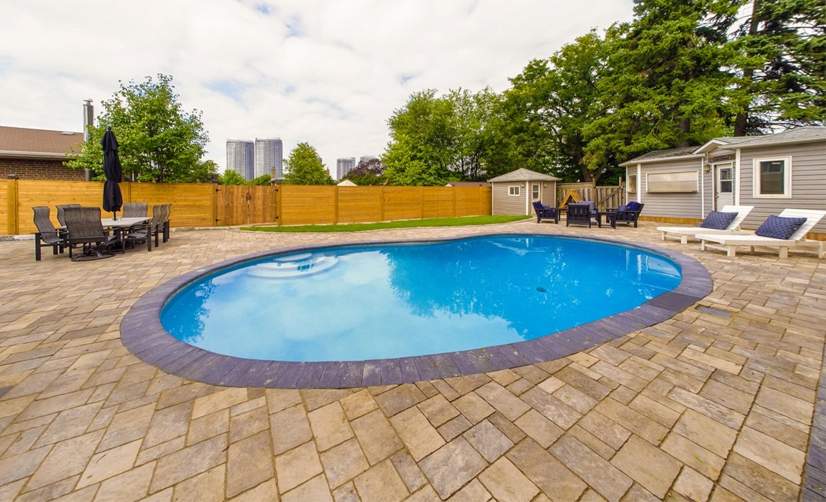 aesthetic style interlocking surface around pool in home full yard