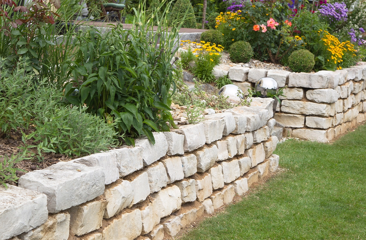 armour stone retaining wall hold soil behind