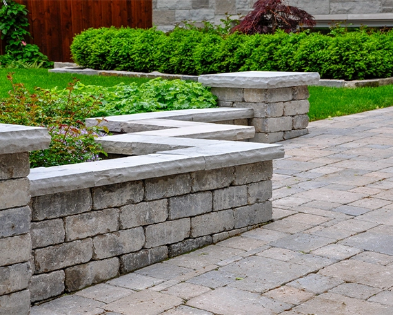 small armour stone retaining wall in yard