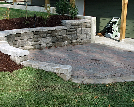 custom round design armour stone retaining wall