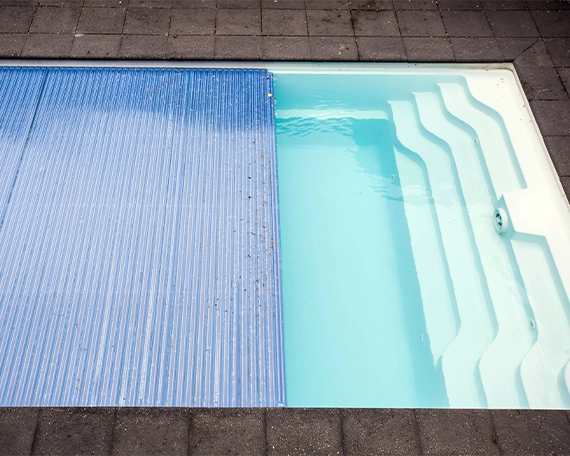 automatic pool cover image five automatic pool cover closing the swimming pool