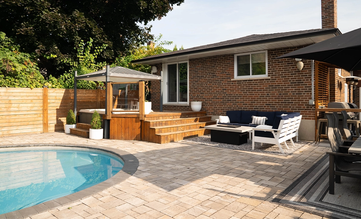 backyard interlocking surface around pool backyard interlocking surface around pool , plunge and sitting setup