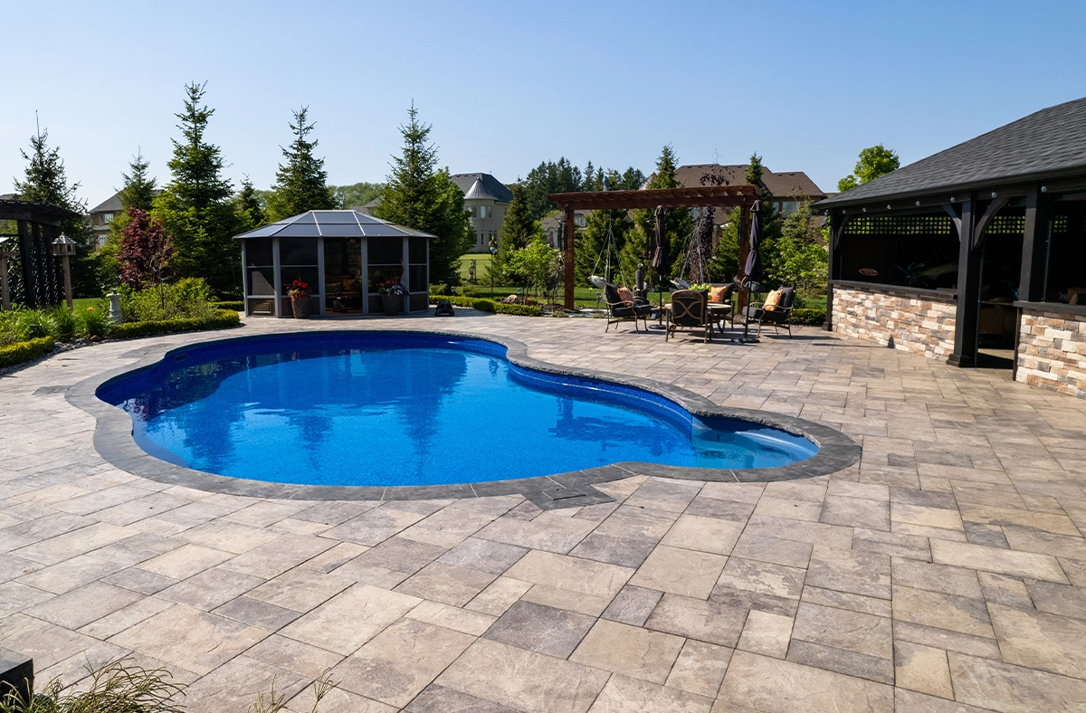 backyard pool with interlocking deck interlocking deck surface around pool in backyard