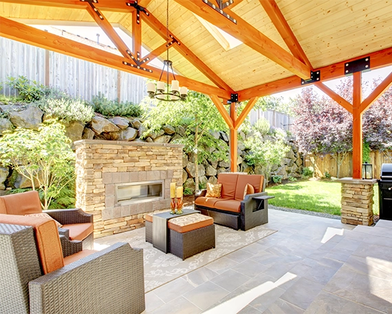 gathering setup, rock fence design, cabana, patio cover, patio