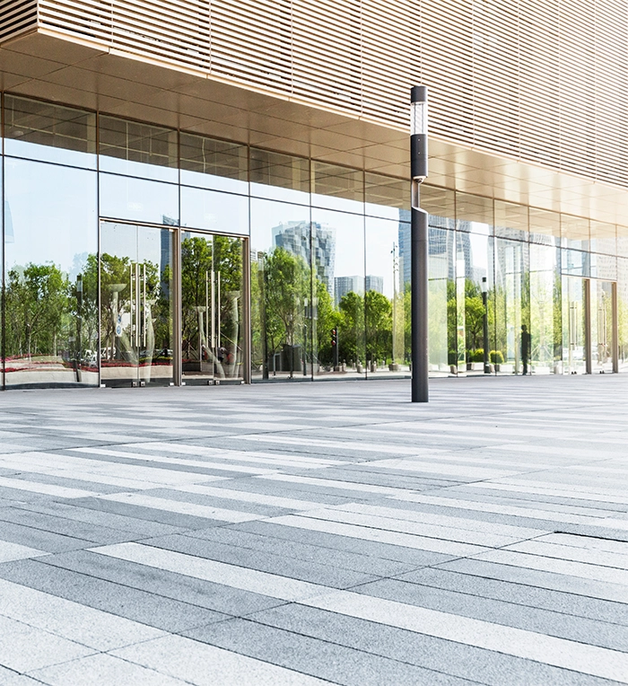 commercial asphalt paving surface in front of building