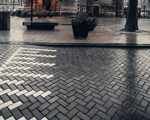 after rain commercial paving road view