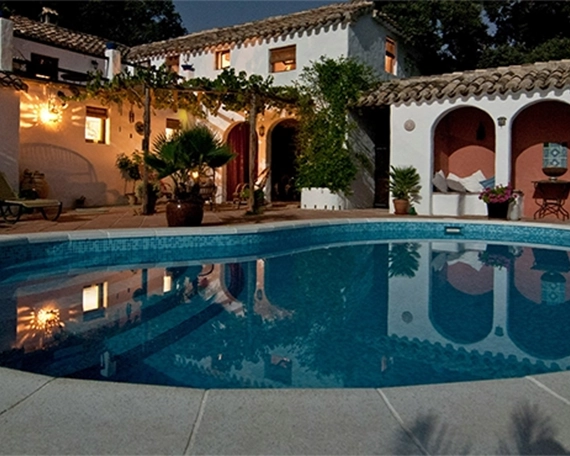 concrete pool image three concrete pool and deck night view at residential building back side