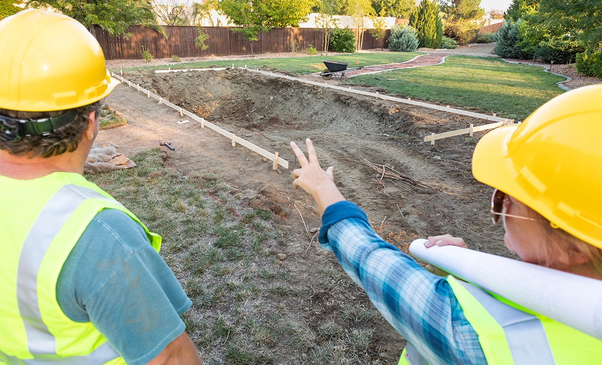 contractors working on pool project