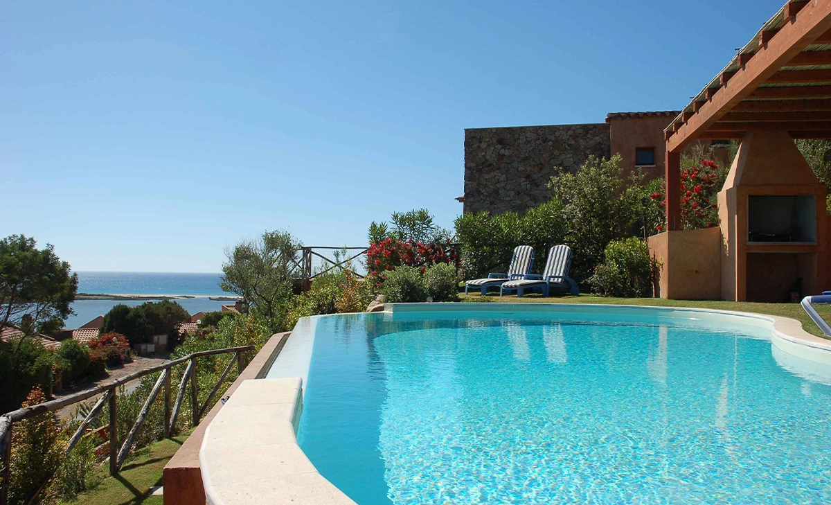 infinity swimming pool in home backyard