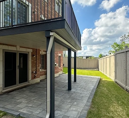 above ground deck on interlock patio