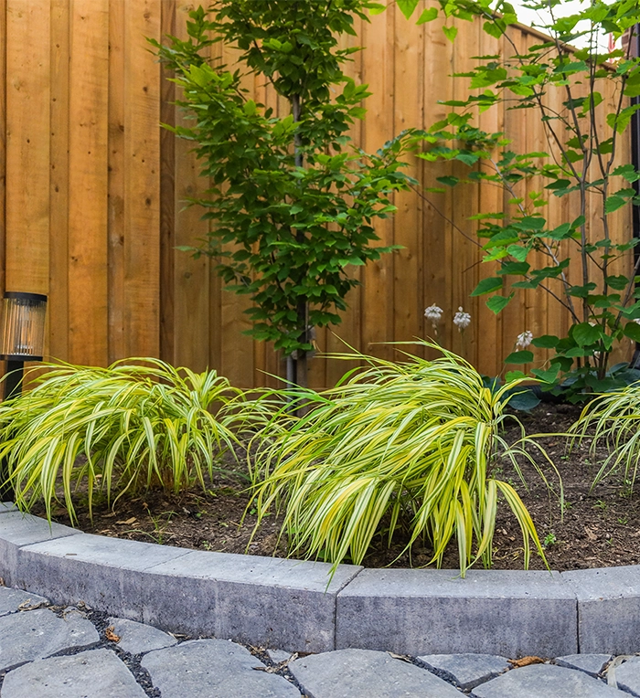 fence with landscape and retain wall
