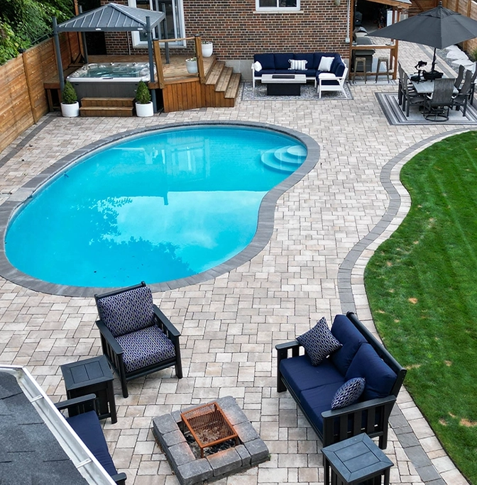 home backyard, interlocking surface, swimming pool, sodding, hot tube with wooden deck