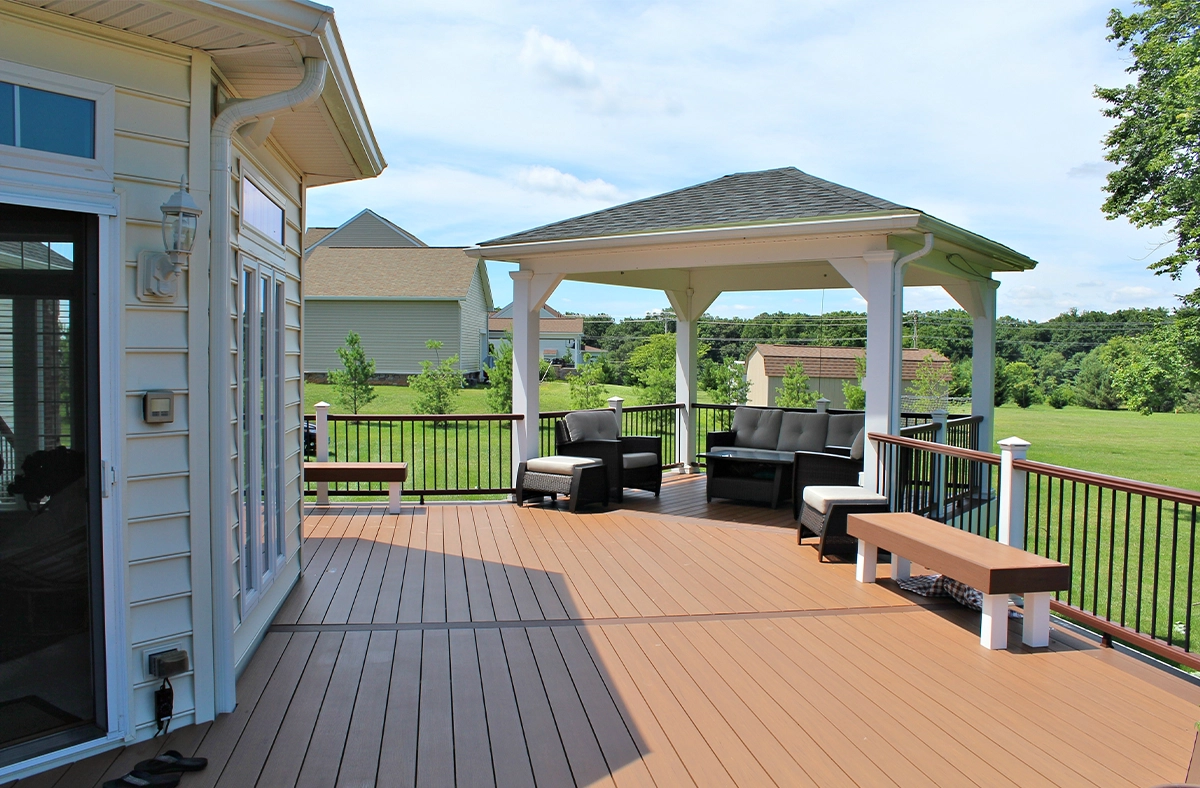 gazebo and above ground deck toward home backyard