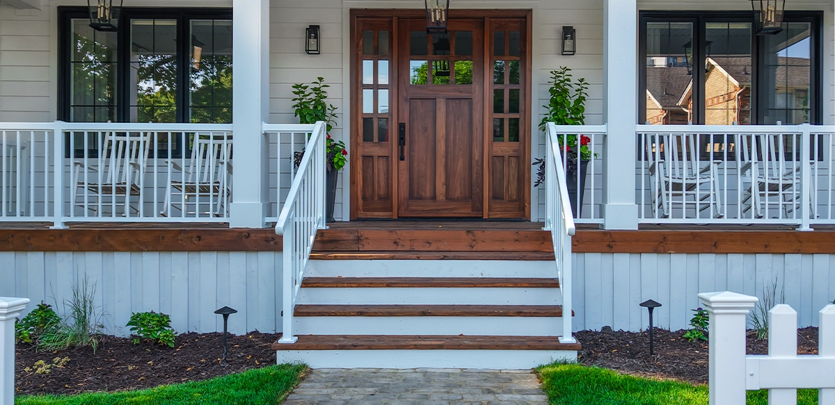 home front porch with railing and stairs, modern doo and windows