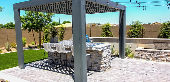 interlock patio with waterfall feature and cabana
