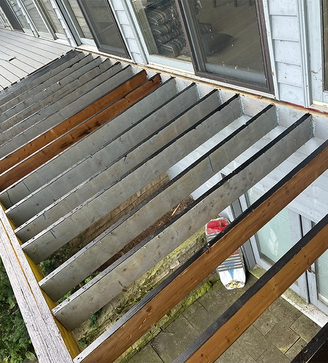 apply a protective epoxy to the top of the joists and beams