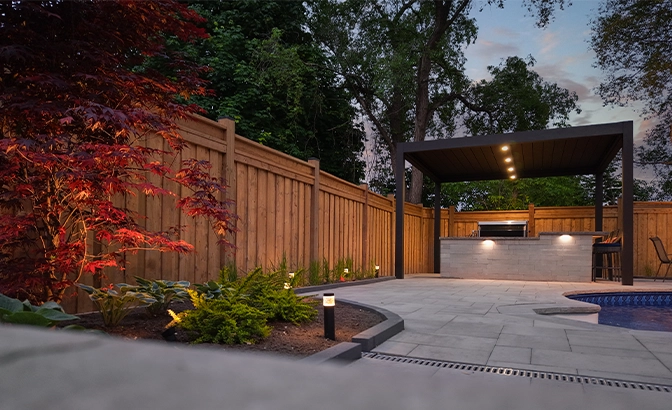 lighting features in backyard landscaping and open kitchen