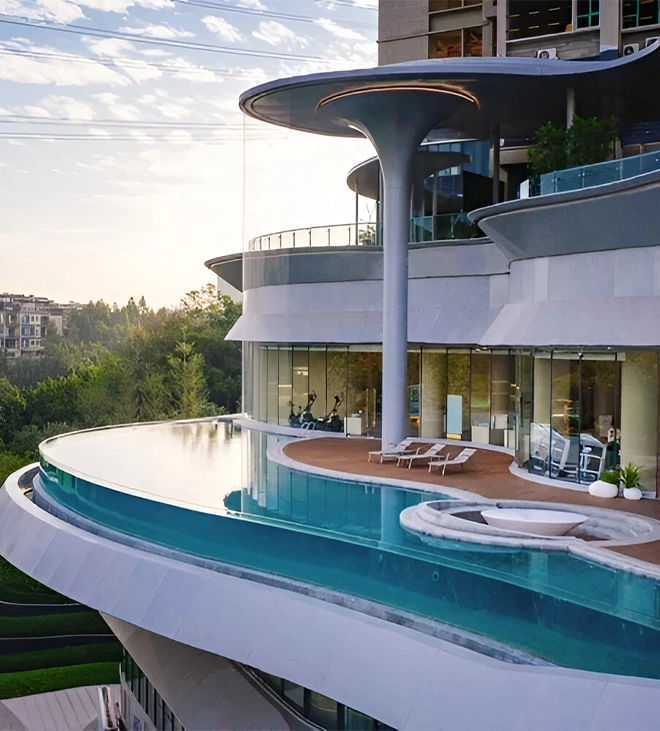 modern commercial building with acrylic and glass walled pool, aesthetic pillar, sting setup on deck