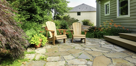 natural stone image two natural stone patio in home backyard