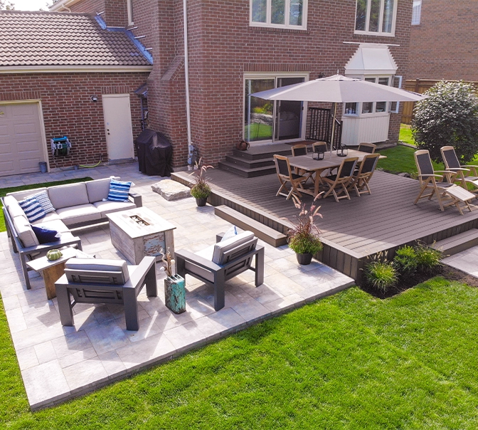 home open backyard space, seating area, garage door and wooden deck