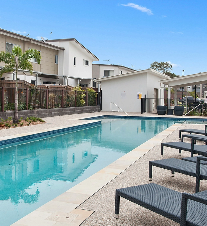 swimming pool with a pool coping in open area