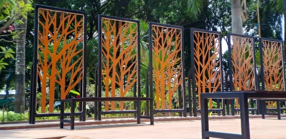 beautiful outdoor privacy screen design, black frame and orange trees design