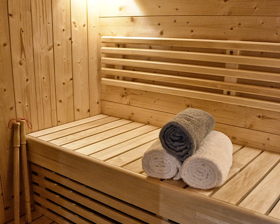 outdoor sauna image three outdoor sauna, towels on bench, heat and light features