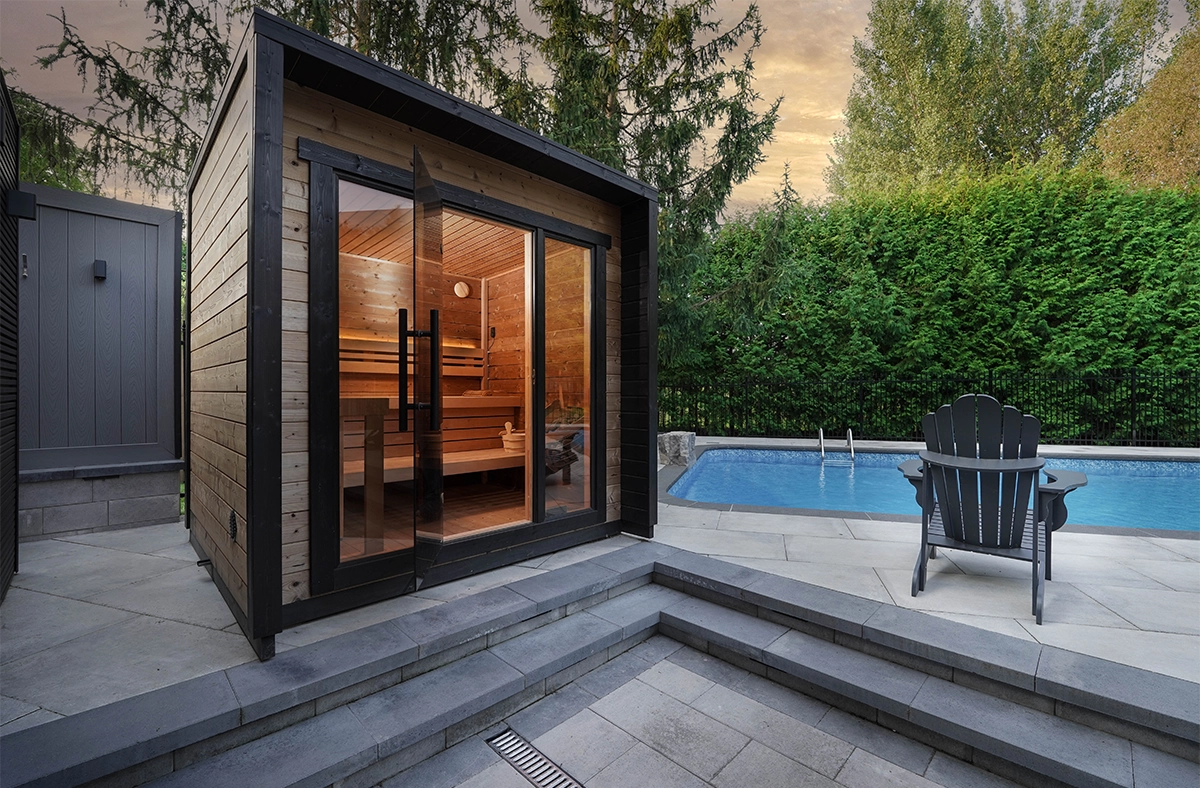 outdoor sauna, swimming pool, interlocking patio and steps in backyard