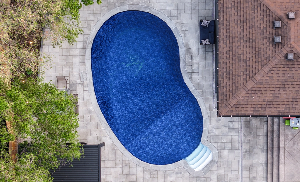 top view of swimming pool with interlocking surface