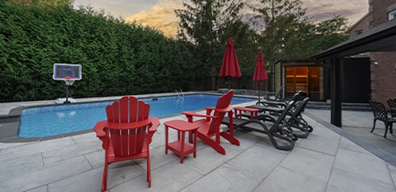 interlocking surface around pool and seating area