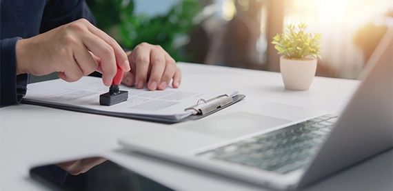 man approving permit documentation