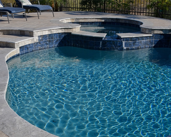salt water pool with interlock pool coping and deck