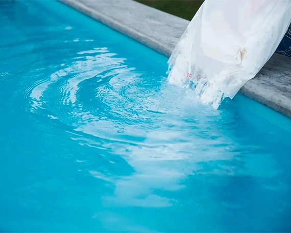 adding salt in salt water pool